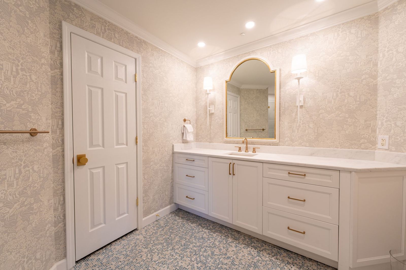 Bathroom with a marble vanity top